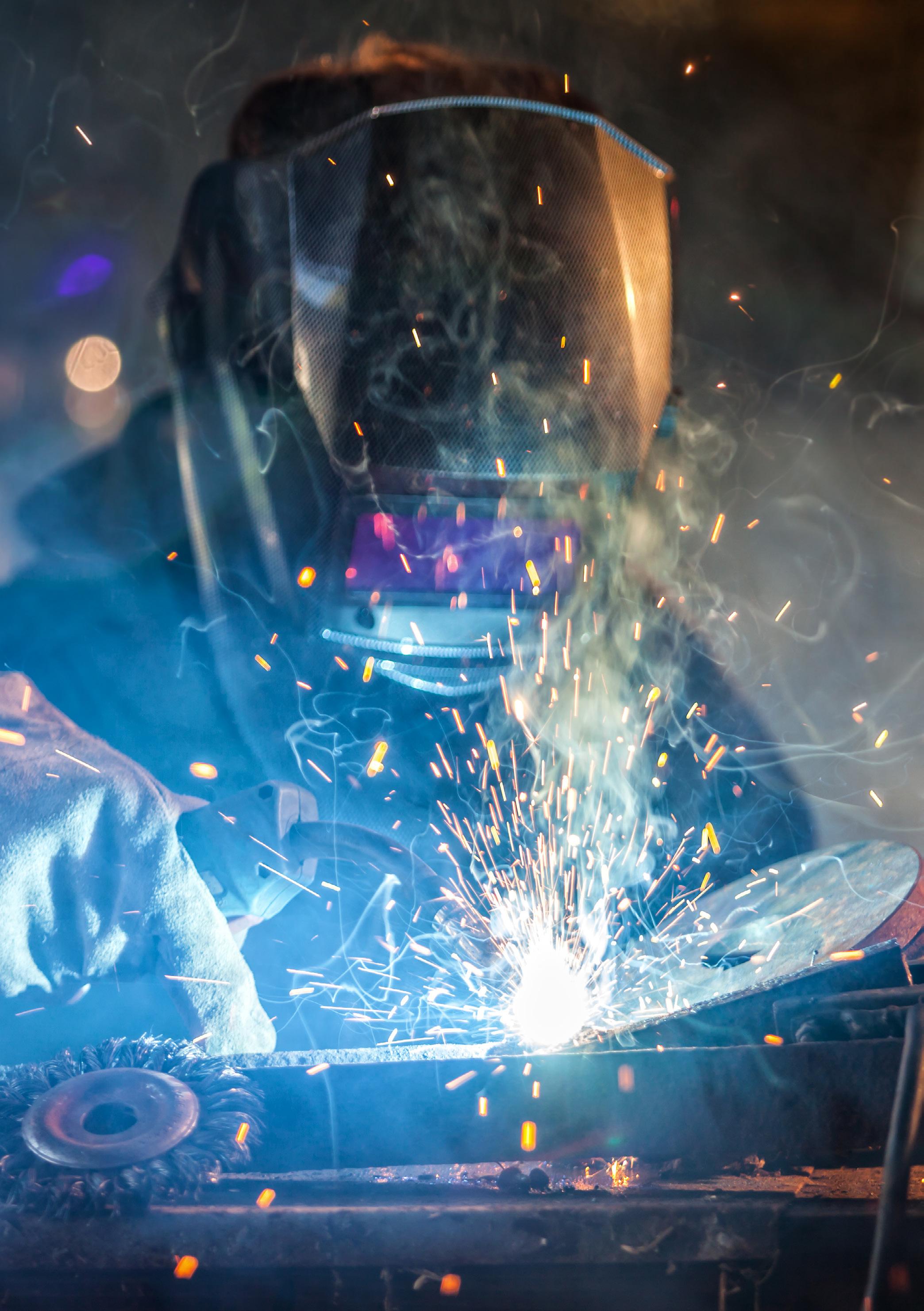 Welders Ghana staff member welding on site at a residential property in East Legon Accra